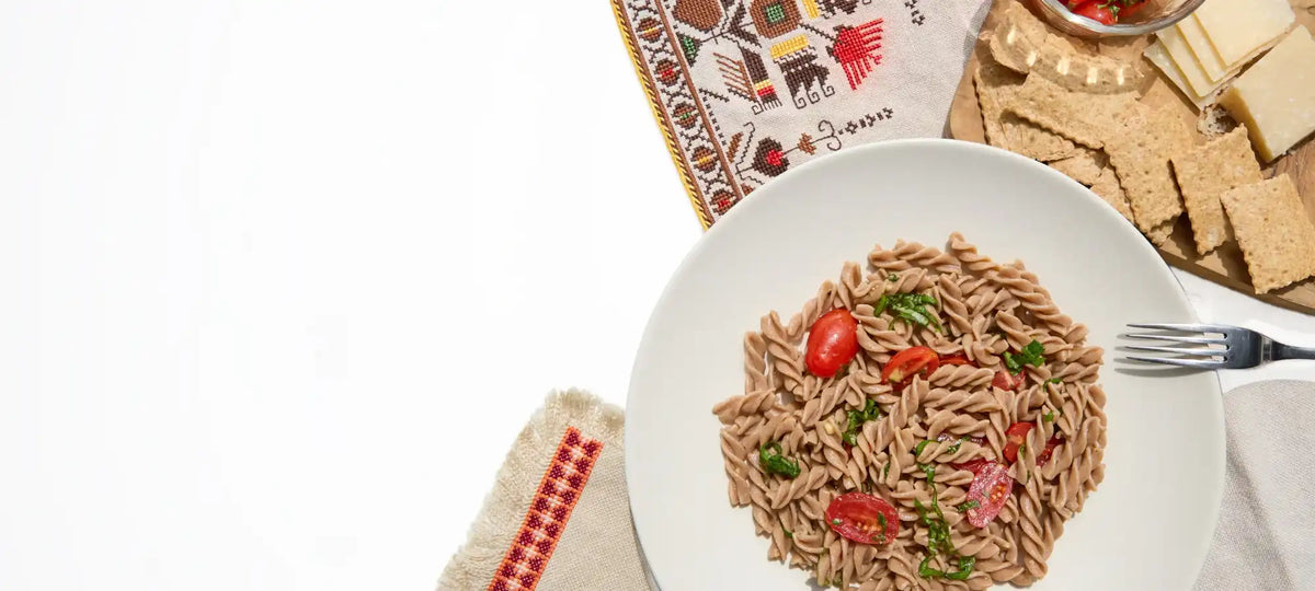 Plate of Organic Einkorn Fusilli with assorted ingredients